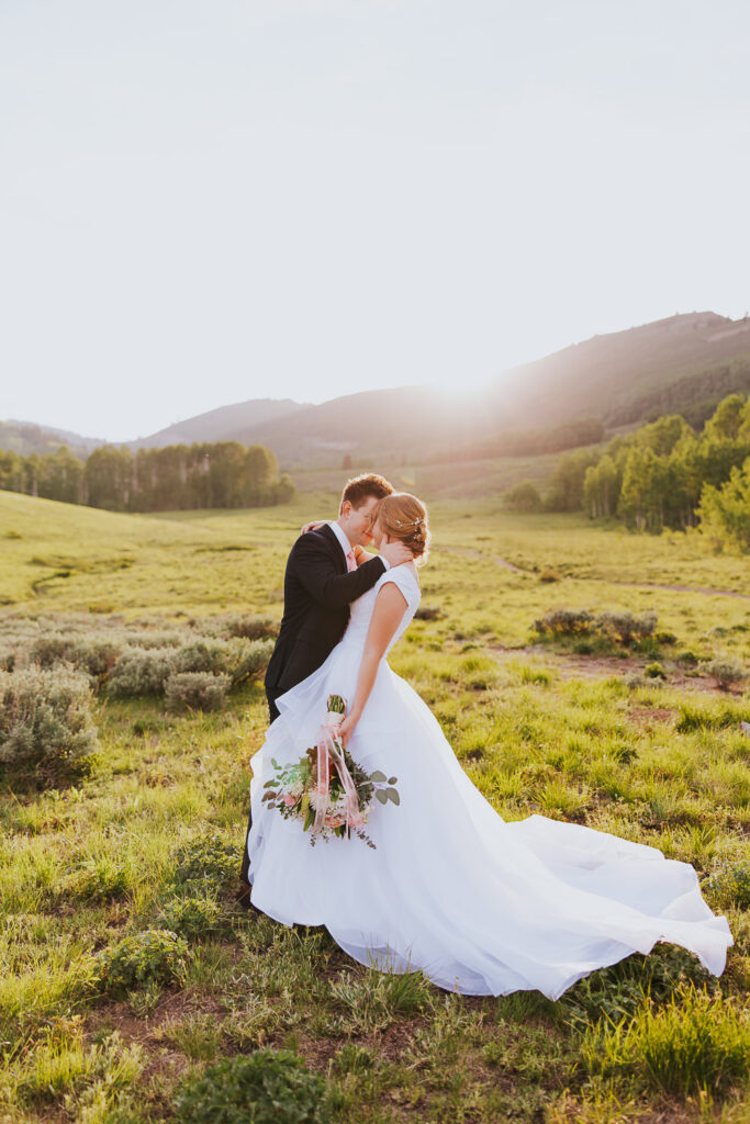 Bride and groom stand together in Utah wedding ceremony