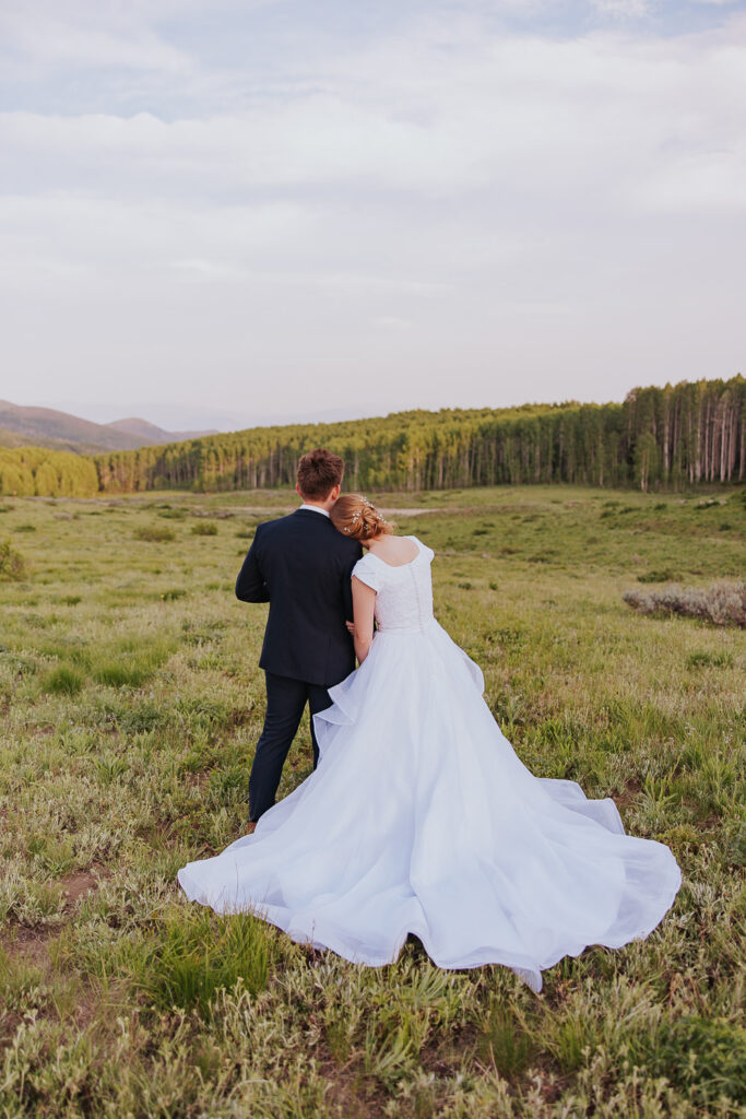 Detail of Utah wedding dress in green field