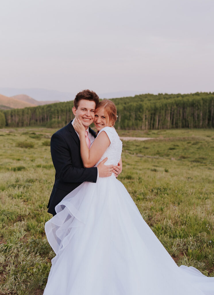 Fun wedding pose for bride and groom