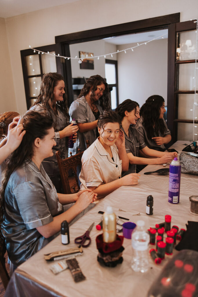 Bridesmaids get ready together before wedding in Toledo, Ohio