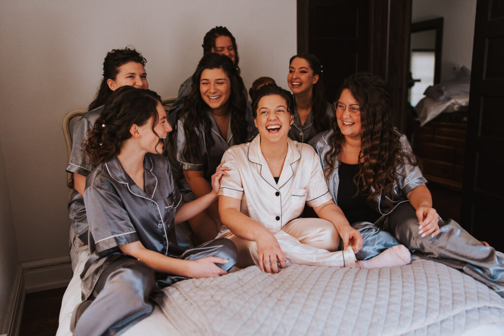 Bridal party laughs as they get ready for Toledo Ohio wedding