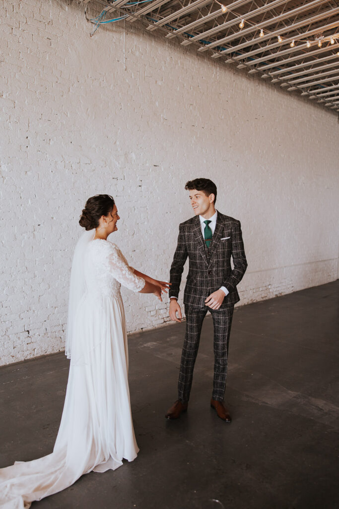 First look for bride and groom in an industrial setting in Ohio