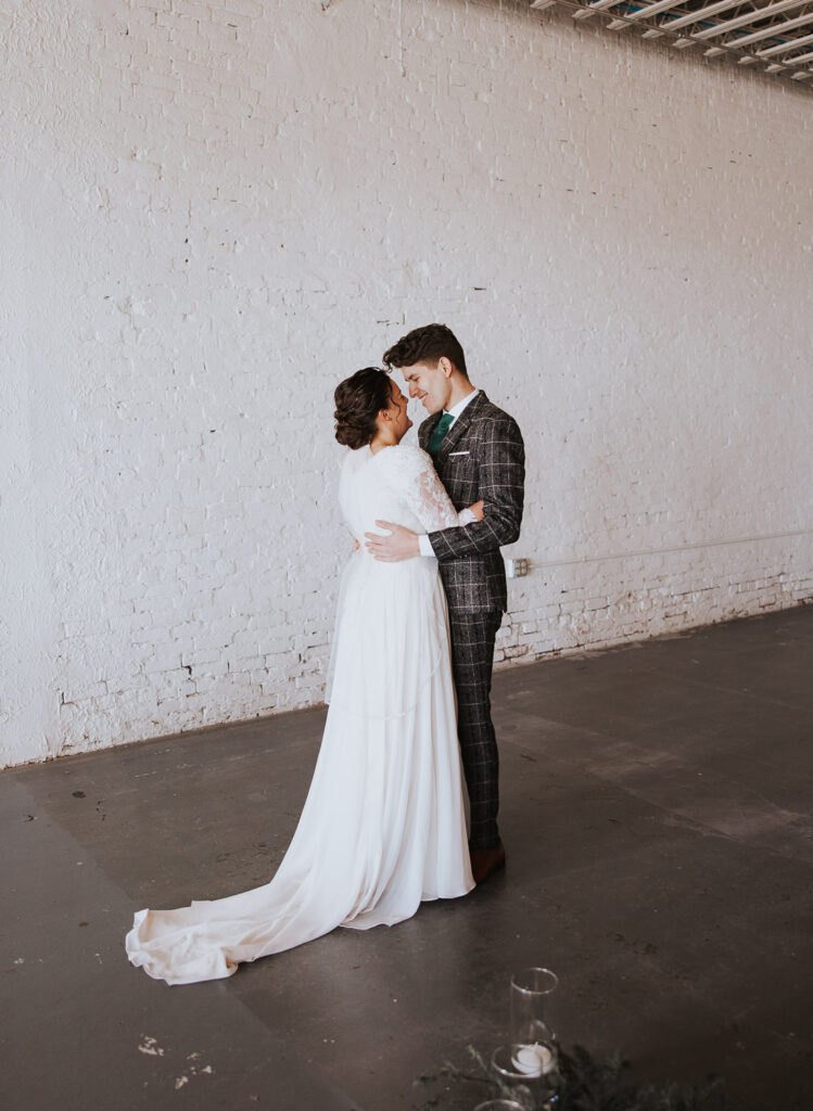 Bride and groom embrace during a downtown wedding ceremony in Ohio