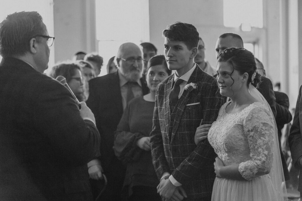 Bride and groom listen to counsel before wedding in Ohio